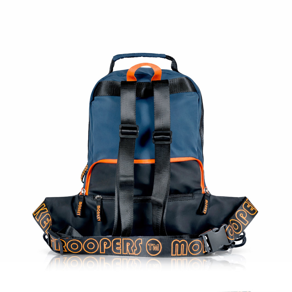 Black and navy Banger Convertible Backpack by Monkey Troopers with adjustable straps and multiple compartments.